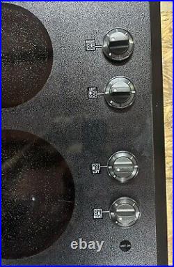 30 GE 4-Burner Electric Drop In Cooktop JP34080W1BB (Black)