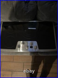 36 in GE Electric Cooktop 5 Burners Stainless Steel And Black. MO# P P962S0M1SS
