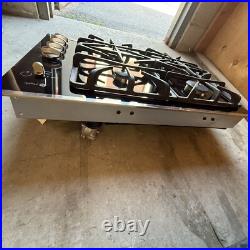 GE 30 Inch Gas Cooktop with 4 Sealed Burners, Continuous Grates JGP900SEKSS