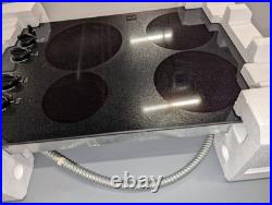 GE 30 in. 4-Burner Electric Cooktop with Simmer Burner & Power Burner GE 30 in. 4-Burner Electric Cooktop with Simmer Burner & Power Burner