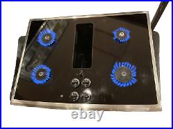 GE Profile 30 gas cooktop with downdraft in black 4-burners