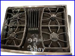 GE Profile 30 gas cooktop with downdraft in black 4-burners