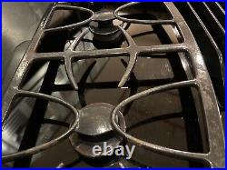 GE Profile 30 gas cooktop with downdraft in black 4-burners