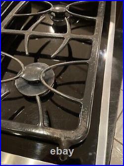 GE Profile 30 gas cooktop with downdraft in black 4-burners