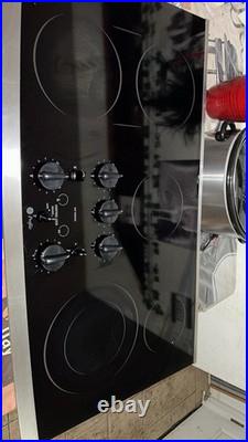 GE Profile Electric Cooktop 5 Burners Black Smooth Top Knob Controls Built-In