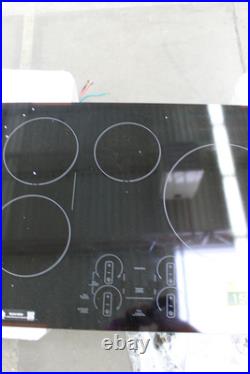 GE Profile PHP9030DTBB 30 Black 4 Element Induction Cooktop NOB #150745