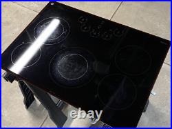 GE Profile Series PP9030DJ1BB 30 Built-In Electric Cooktop Black 5 Elements GE Profile Series PP9030DJ1BB 30 Built-In Electric Cooktop Black 5 Elements