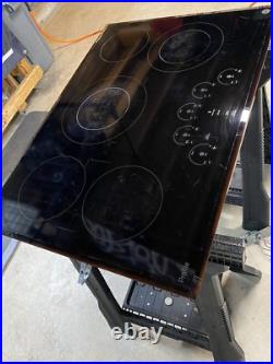 GE Profile Series PP9030DJ1BB 30 Built-In Electric Cooktop Black 5 Elements GE Profile Series PP9030DJ1BB 30 Built-In Electric Cooktop Black 5 Elements