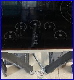 GE Profile Series PP9030DJ1BB 30 Built-In Electric Cooktop Black 5 Elements GE Profile Series PP9030DJ1BB 30 Built-In Electric Cooktop Black 5 Elements