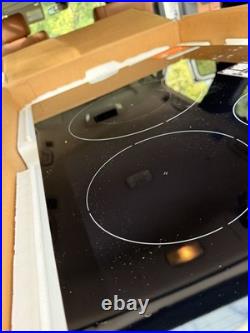 KitchenAid 30-in 5 burners Induction Cooktop Black Glass KCIG550JBL
