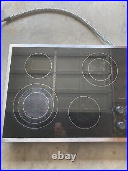KitchenAid KECC506RSS05 30in. 4 Element Electric Cooktop Black Glass TESTED