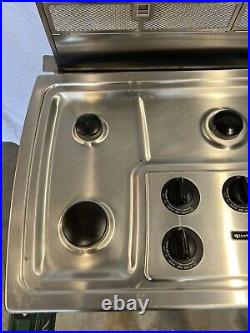 KitchenAid KGCS166GSS0 36 sealed burner gas cooktop with retractable downdraft