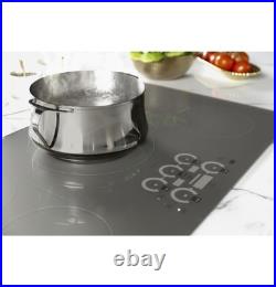 Monogram 30 Inch Wide 4 Burner Induction Cooktop(ZHU30RSTSS)-NEW