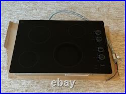 Whirlpool W5CE3024XB00 30in Ceramic, Built-In Electric Cooktop Black