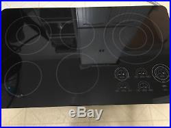 Wolf 36 inch electr. Cooktop model ct36eu with 5 elements and 9 zones. Pre-owned
