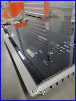 Wolf Model CT30E/S Electric Cooktop Black With Stainless Steel Trim 4 Burner