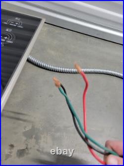 Wolf Model CT30E/S Electric Cooktop Black With Stainless Steel Trim 4 Burner