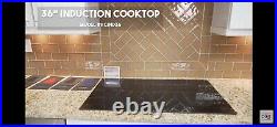 Zline 36 Inch Electric Induction Cooktop With 5 Burners Color black